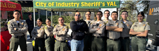 Group of Sheriffs Youth Program Members Posing Under Event Tent